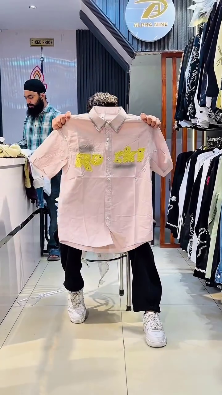 Light Blue Acid-Wash Half-Sleeve Button-Down Denim Shirt with Bold “TRM SED” Front Typography Print and Classic Collar Design