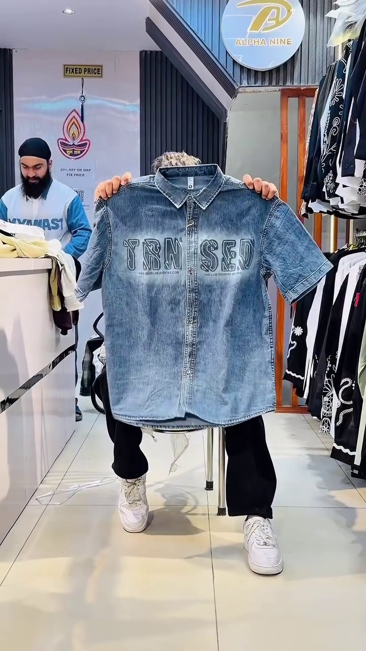 Light Blue Acid-Wash Half-Sleeve Button-Down Denim Shirt with Bold “TRM SED” Front Typography Print and Classic Collar Design