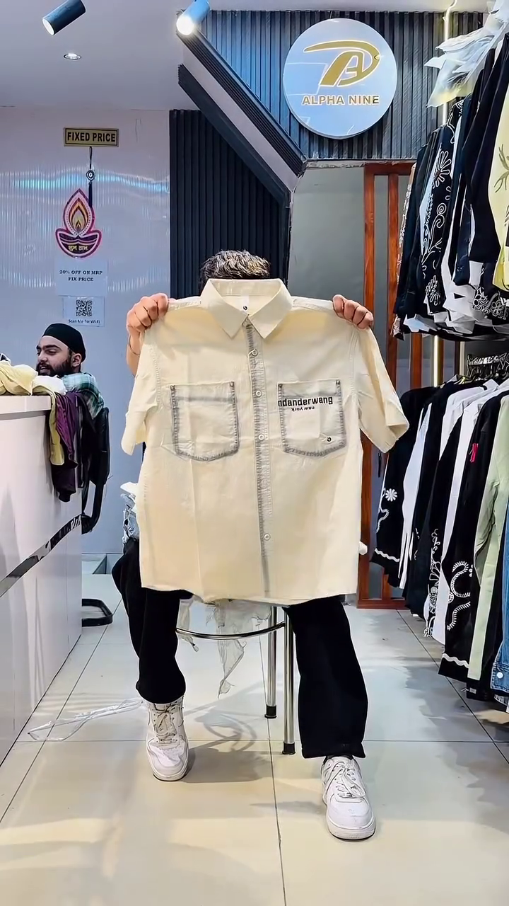 Light Blue Acid-Wash Half-Sleeve Button-Down Denim Shirt with Bold “TRM SED” Front Typography Print and Classic Collar Design